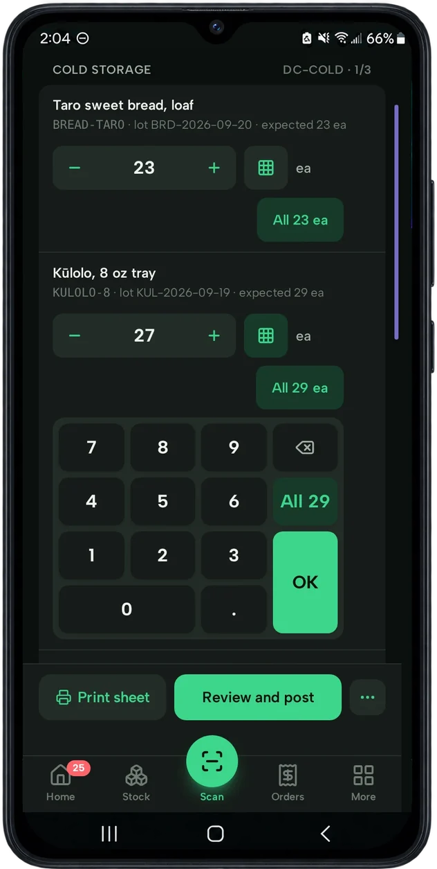 A stock count in progress on a phone: one shelf counted, the next being typed on the keypad